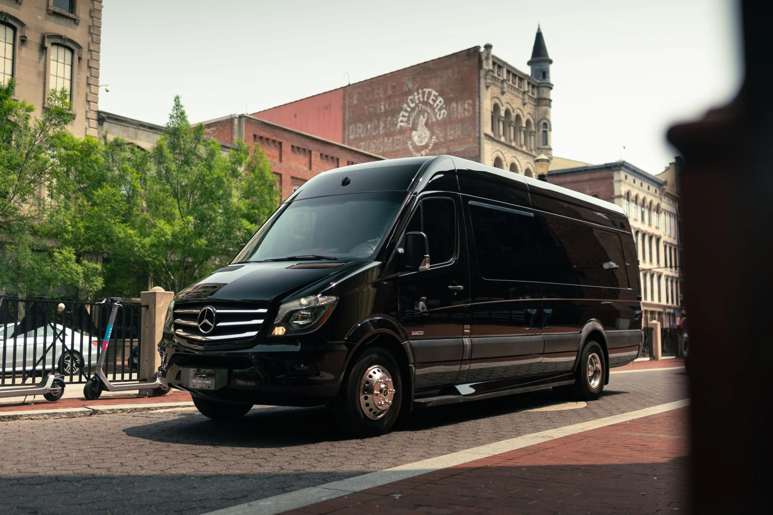 Mercedes Sprinter party bus parked in downtown Louisville