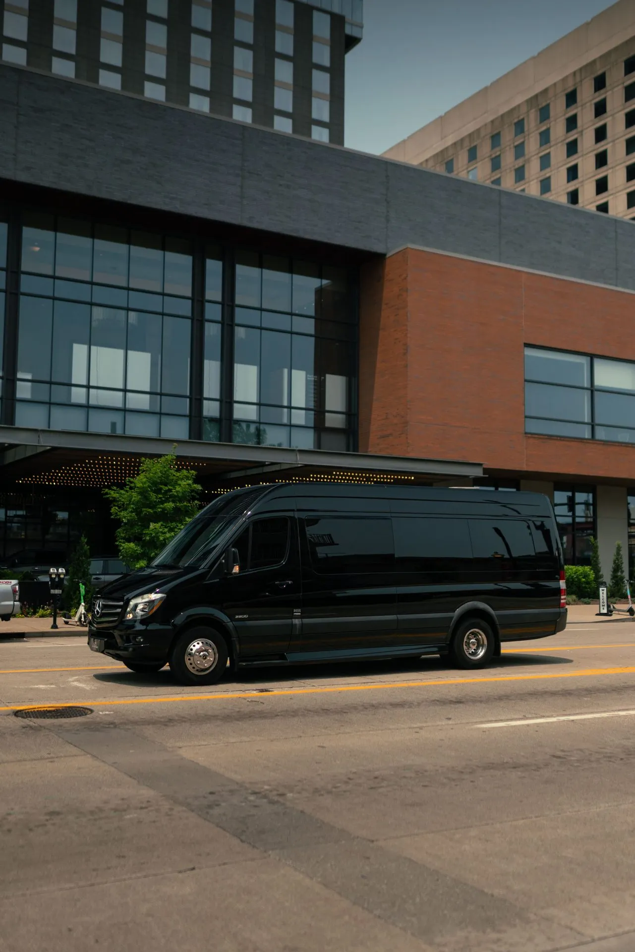Mercedes Sprinter waiting outside an office building in Louisville
